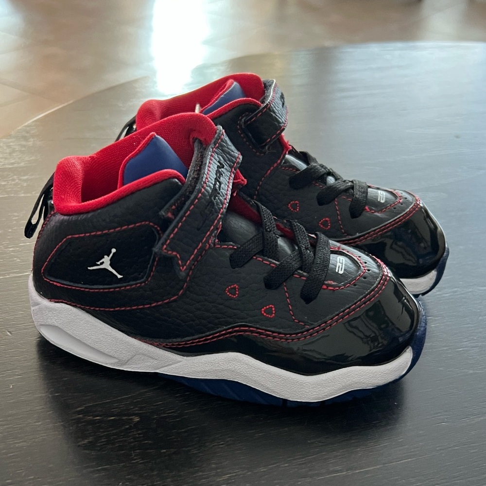 Jordan Kids Black and Red Sneakers with Blue Soles.  Toddler, size 8.